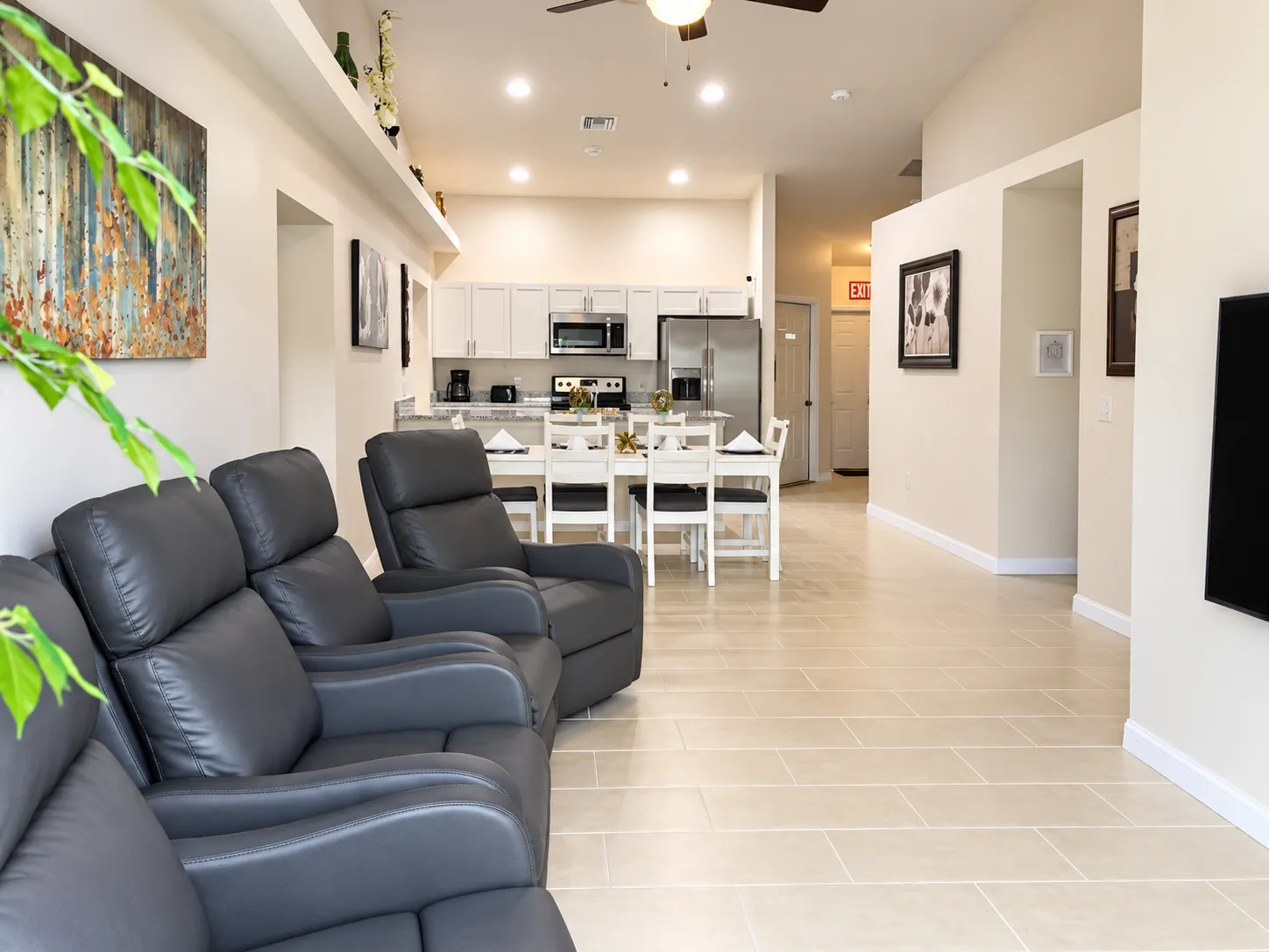 Open living, dining, and kitchen area in the home